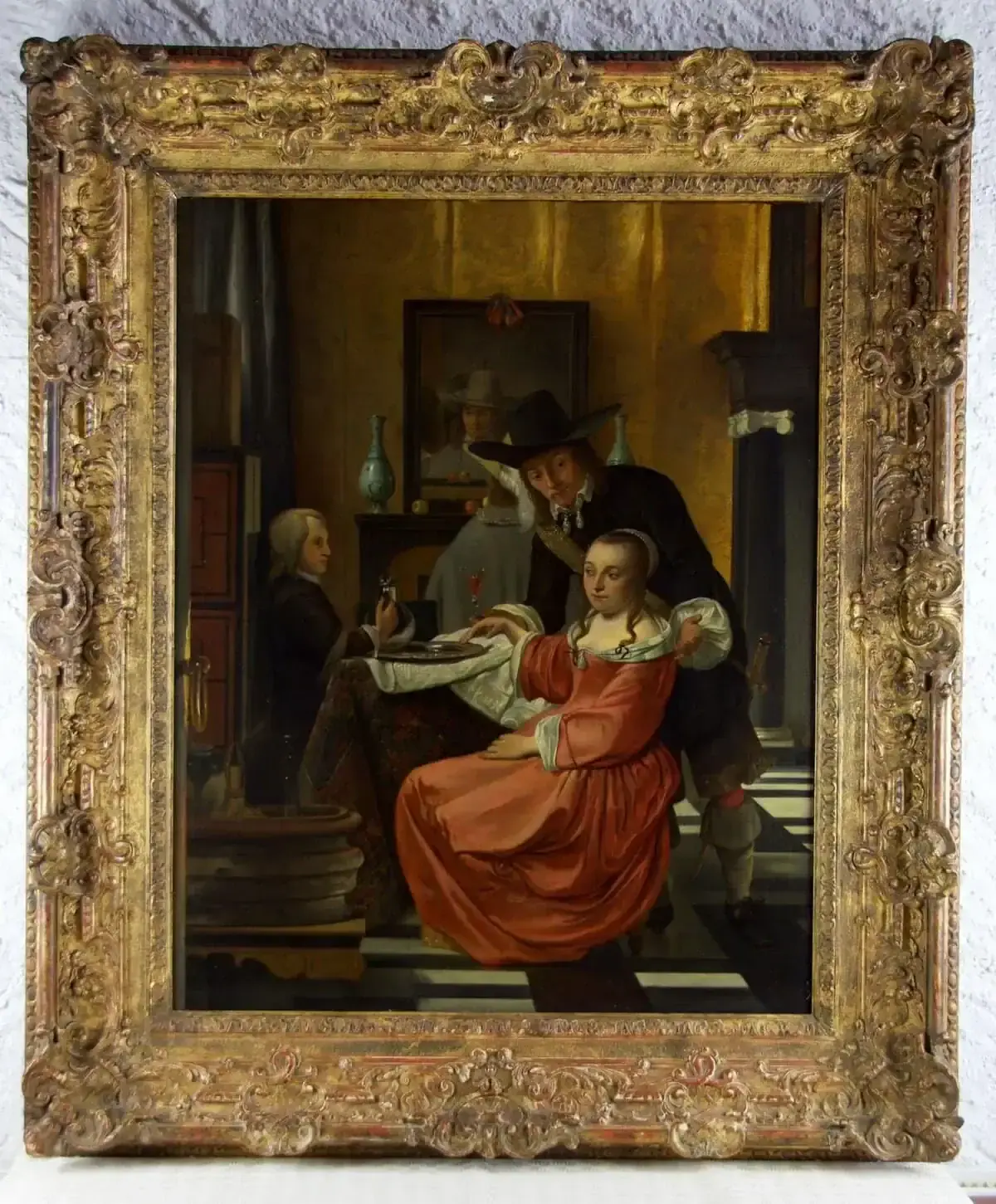 Peinture ancienne encadrée montrant scène intérieure élégante