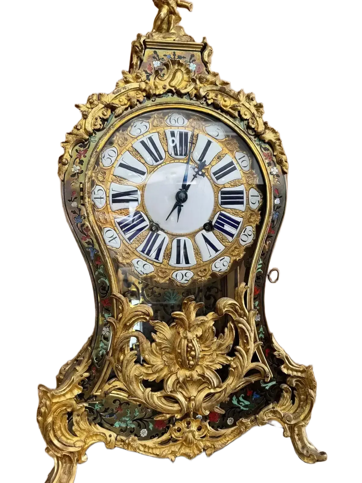 Pendule ancienne dorée style baroque à chiffres romains