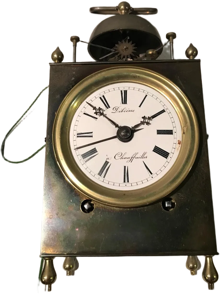 Horloge ancienne en laiton avec chiffres romains
