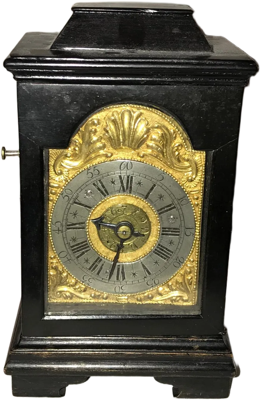 Horloge ancienne en bois noir et cadran doré