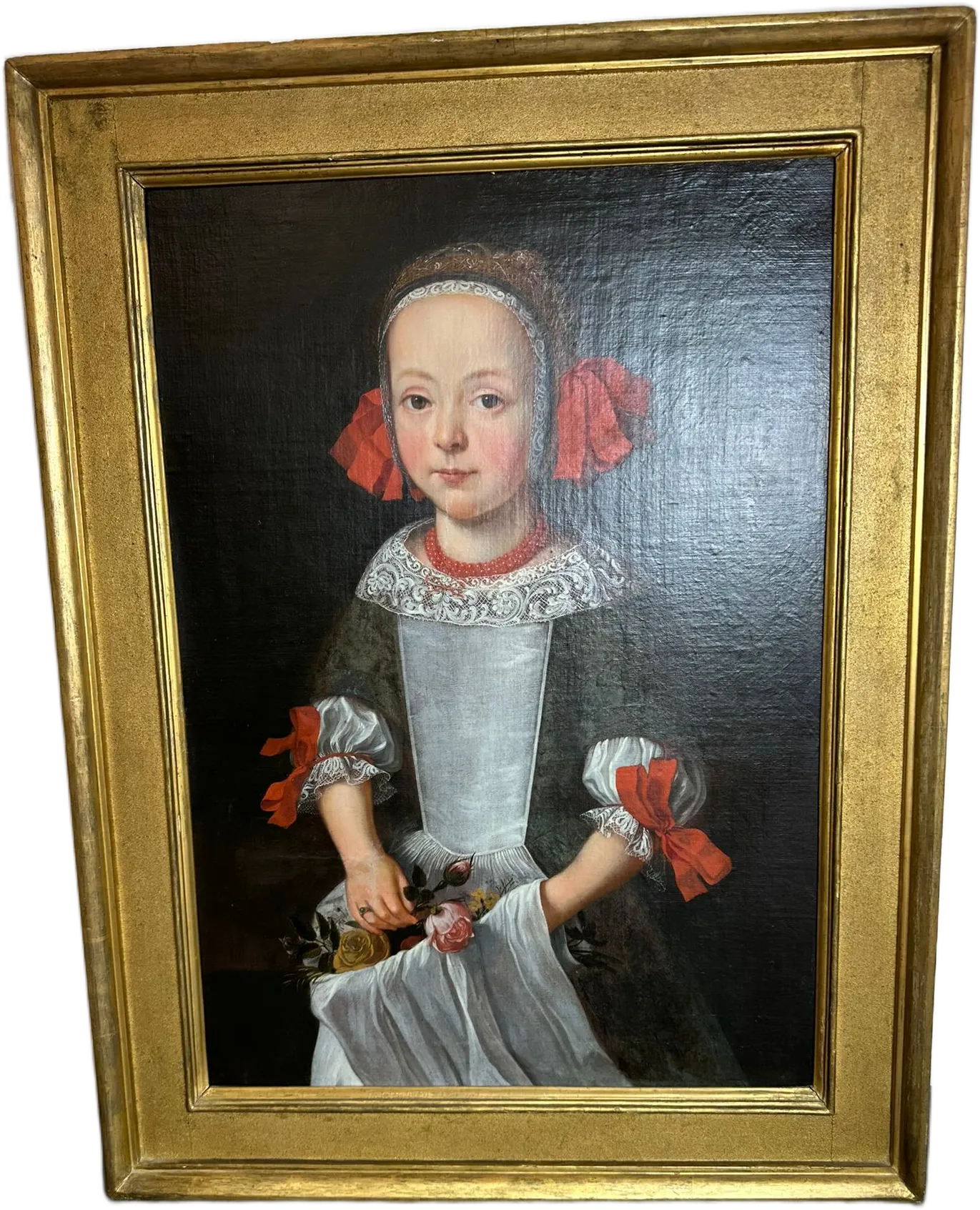 Portrait d'une jeune fille tenant des fleurs